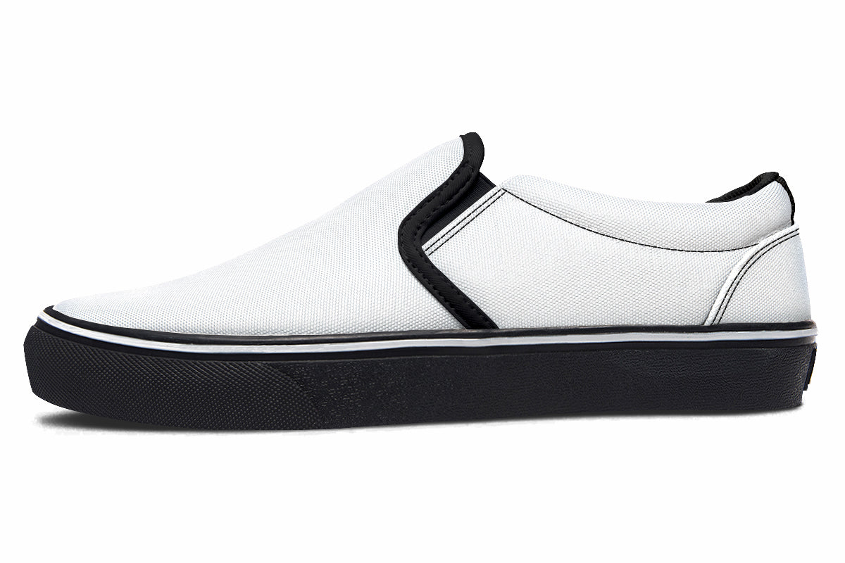Black and White Mismatch Slip Ons