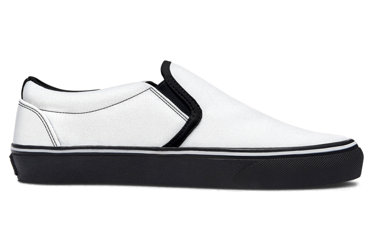 Black and White Mismatch Slip Ons