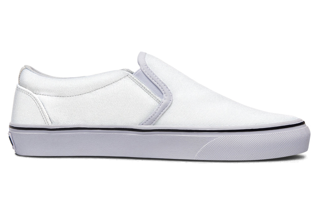 Black and White Mismatch Slip Ons