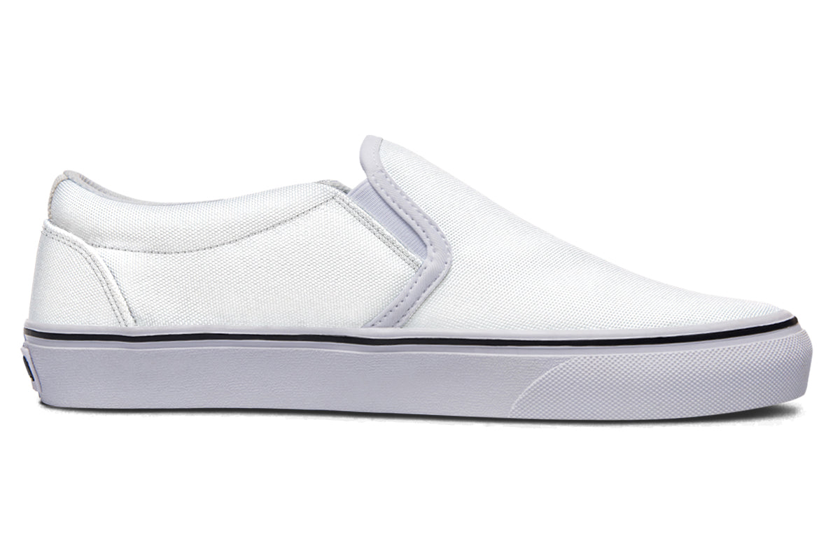 Black and White Mismatch Slip Ons